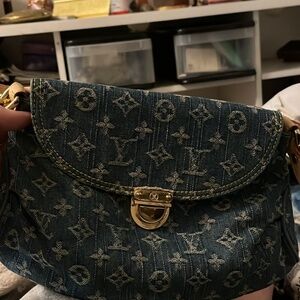 LV denim clutch